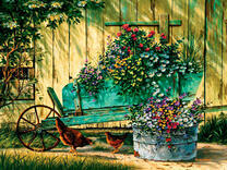 Курочки под тележкой с цветами