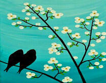 Две птички на цветущей веточке дерева