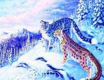 Пара барсов в снежном лесу