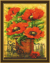 Маки в вазе у забора