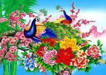 Два павлина на дереве в летних цветах