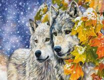 Волки у золотистого дерева в зимнем лесу