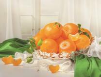 Тарелка полная мандарин