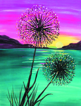Красивые одуванчики на фоне заходящего солнца