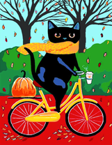 Черный кот с тыквой на велосипеде