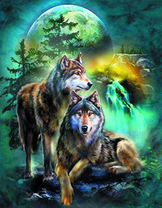 Волки на фоне огромной луны