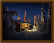 Свет из окна заснеженного домика