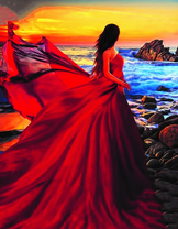 Девушка в красном платье на фоне моря