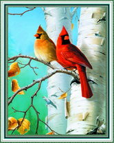 Красные кардиналы на березке