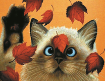 Смешной котёнок и осенние листья