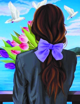 Девушка с букетом тюльпанов у озера