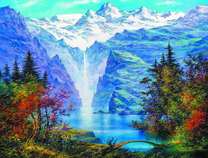 Вид на заснеженные горы и водопад