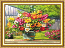 Ведерко с букетом в саду