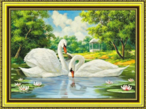 Лебеди на реке у белой беседки