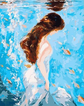 Девушка смотрит на подводный мир