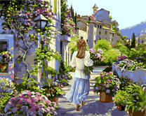 Девушка на улочке в цветах