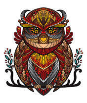 Коричневый филин на ветке