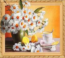 Ромашки, лимон и чашечка чая