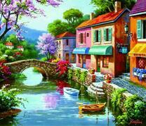 Яркие домики у речушки