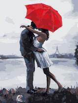 Нежный поцелуй под красным зонтом