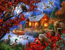 Дом у озера в окружении животных