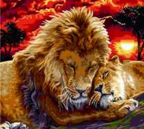 Лев и львица на фоне африканского заката