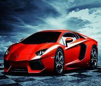 Красный ламборджини под красивым небом