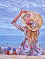 Милая девушка в шляпе на берегу моря