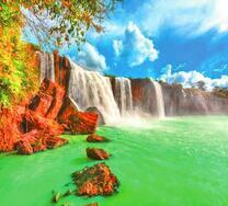 Водопад с лазурной водой на красных скалах