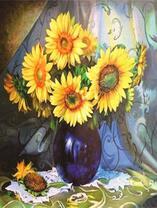 Большие подсолнухи в синей вазе