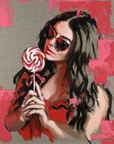 Девушка с большим леденцом