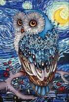 Яркая совушка под ночной луной