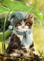 Котенок в шапке под лопухом