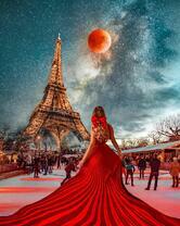 Девушка в красном вечернем платье на фоне Эйфелевой башни