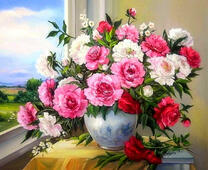 Большой букет разноцветных пионов у окна