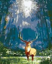 Олень в густом лесу