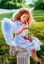 Кудрявый ангелочек в лучах солнца