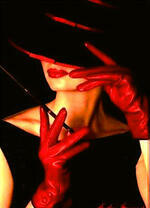 Женщина в шляпе с сигарой