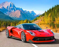 Красный Феррари на фоне гор