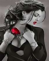 Девушка в вечернем наряде и с розой