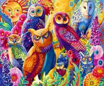 Совы разных пород и яркие цветы