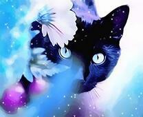 Черный котёнок среди цветов