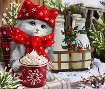 Котёнок с чашечкой молока