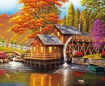 Уютная водяная мельница в осеннем лесу