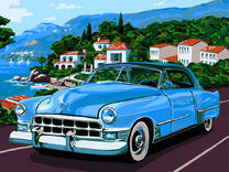 Синий автомобиль у прибрежного города