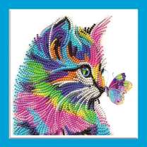 Цветной котенок с бабочкой на носу