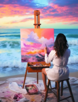 Девушка рисует морской пейзаж