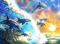 Стая дельфинов играет с волной