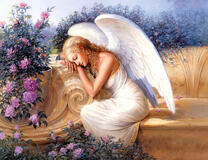 Грустный ангел среди цветов