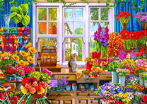 Кот в цветочном магазинчике